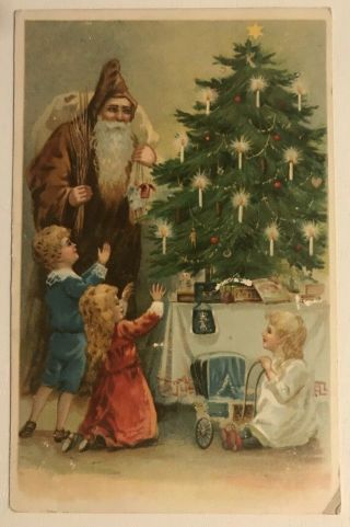 Long Brown Robe Santa With Children & Xmas Tree C.  1910 Christmas Postcard - C510