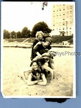 Black & White Photo F,  1701 Pretty Women Posed On Top Of Men On Beach