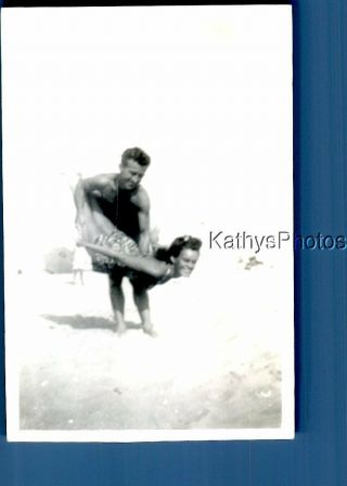 Found B&w Photo F,  4048 Shirtless Man Posed Holding Woman In Swimsuit Over Beach