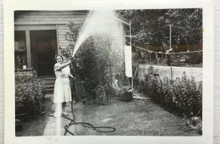 Found Photo Vintage Snapshot 1940s Woman Having Fun With A Hose And Water.