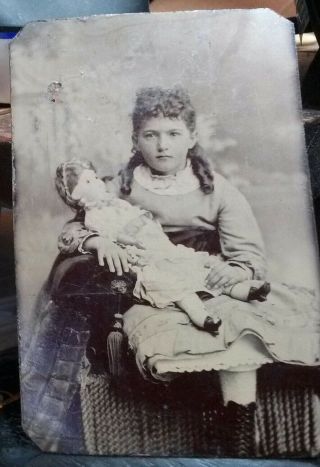 Cdv Size Tin Type Serious Young Girl Holding A Large China Head Doll