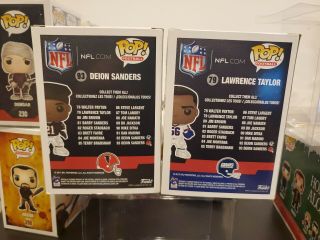 FUNKO POP DEION SANDERS 93 LAWRENCE TAYLOR 79.  TOYS R US EXCLUSIVE.  CHECK PICS 2