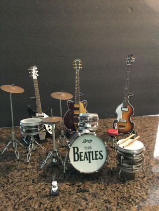 Miniature Guitar,  Bass & Drum Set The Beatles Musical Instruments Display Only