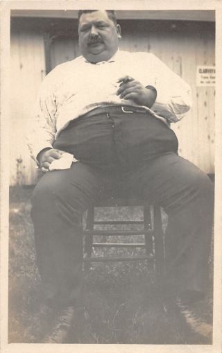 F37/ Interesting Real Photo Rppc Postcard C1910 Fat Man Smoking Cigar Chair