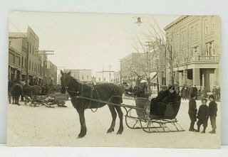 Rppc Town Scene Horses Sleigh Thrilling Attractions Wall Paper Drug Postcard J5