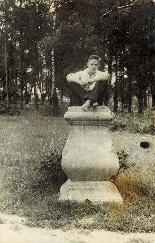 Photo From The Ussr: Young Man Sits On Old Monument 