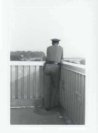 Vintage Photo Abstract Photo Of Police Officer From Behind Sneaky Creepy