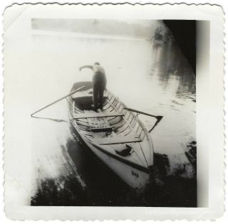 Gone Fishing.  Artistic Vintage Found Photo Of A Person Standing In A Rowboat B&w