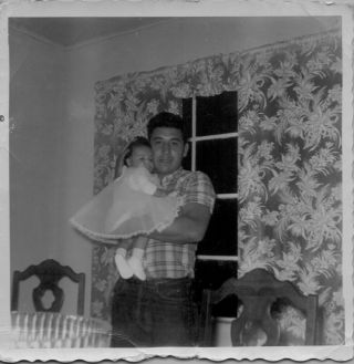 Vintage Photo Of Hispanic Man Holding His Baby Daughter In A Dress 1958 Window