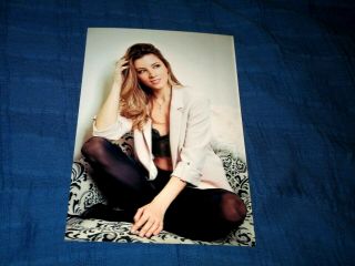 Dirty Blonde Model Posing In A White Jacket & Black Pantyhose Photo