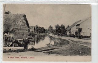A Back Street,  Victoria,  Labuan: Malaya Postcard (c39668)