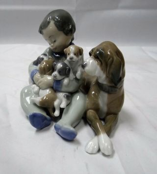 Lladro Figurine 5456 " Playmates " Boy With Dog And Puppies Porcelain Figurin