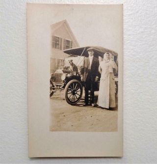 Antique Real Photo Postcard Couple With Pitbull Terrier Dog Sitting On Car Rppc