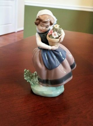 Lladro Figurine " Spring Is Here " Girl Holding Flower Pot 5223