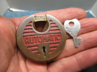 Old Round Brass Pancake Padlock Lock Automatic With A Key.  N/r