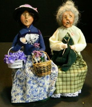 (2) Byers Choice The Carolers Signed Woman W/ Violets,  Woman Knitting,  On Bench