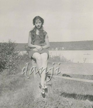 Pretty Girl With Long Hair Over Her Shoulders Sitting On A Fence Post Old Photo