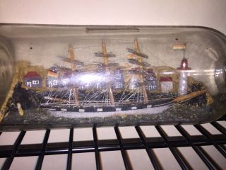 Antique Ship In A Big Bottle With City In Background Great Artwork