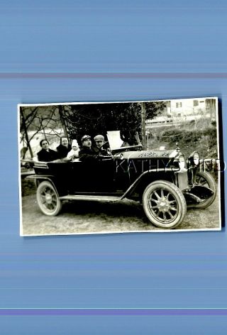 Real Photo Rppc T_9036 Men And Women Posed Sitting In Old Car