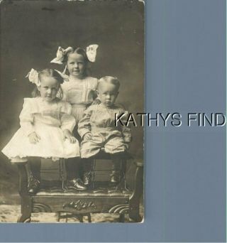 Real Photo Rppc A,  1886 Girls In Dresses Sitting With Boy
