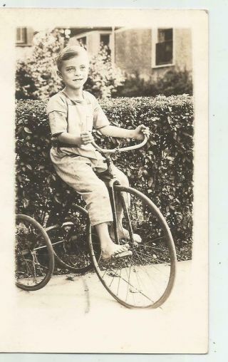 Real Photo Postcard Young Boy On A Big Wheel Tricycle 1920s?
