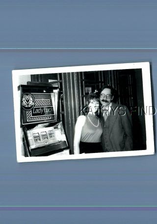 Real Photo Rppc T_8942 Man Posed With Pretty Woman By Slot Machine