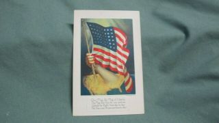 Postcard Patrotic Arm Coming Out Of Map Of America With American Flag