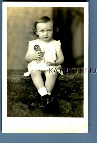 Real Photo Rppc E,  9226 Girl In Dress Sitting On Couch Holding Doll