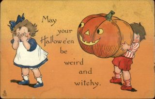 Halloween Boy W/ Giant Jol Scares Girl Tuck 188 C1910 Postcard