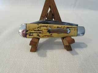Vintage Camillus 4 Line Bone Swell End 2 Blade Trapper Pocket Knife Made In Usa