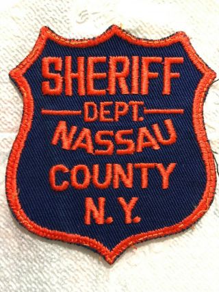 FIRST ISSUE OLD NASSAU COUNTY YORK DEPUTY SHERIFF ' S PATCH (ORANGE & BLUE) 7
