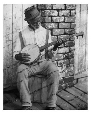 1900s Era Vintage Photo - Old African American Man On Stool Playing Banjo - 8x10 In