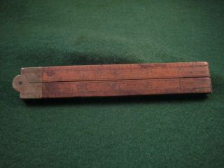 Vintage Stanley Number 61 24 Inch Folding Rule Brass And Wood With Its Pins.