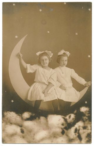 Rp - Two Girls Sitting On Paper Moon