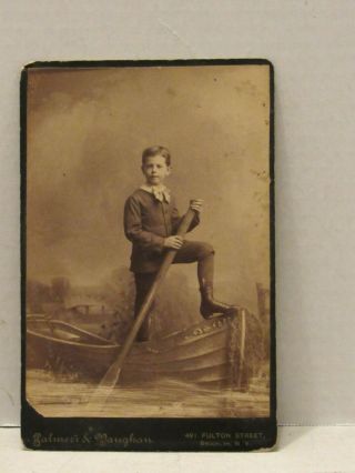 Antique Cabinet Card Photograph Little Boy Standing In A Row Boat With Oar