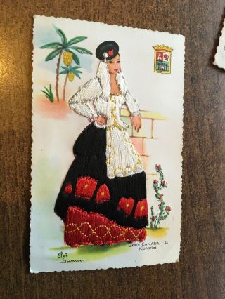 VINTAGE SPANISH EMBROIDERED SILK POSTCARD - LADY IN BLACK WITH ROSE. 2