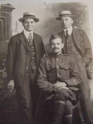 VTG WW1 REAL PHOTO POSTCARD - SOLDIER SITTING & TWO MEN STANDING - LIT CIGARETTE 2