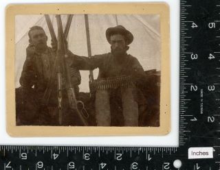 Men in tent posing with rifles / guns and bullets Vintage photo hunting 2