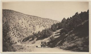Out West: Head - On View Of Model T Or Similar Car On Mountain Road,  1920s