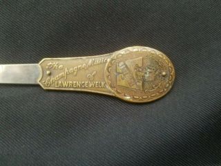 Neat Vintage The Champagne Music,  Lawrence Welk Letter Opener,  Nail File