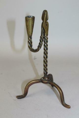 A MUSEUM QUALITY AND RARE 18TH C BRASS RUSHLIGHT IN SMALL SIZE AND GREAT SURFACE 2