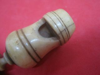 Antique Carved Whistle and Wood 4