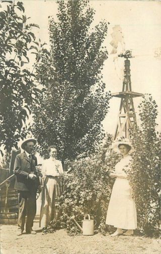 C - 1910 Gardening Flower Picking Windmill Watering Can Rppc Photo Postcard 878