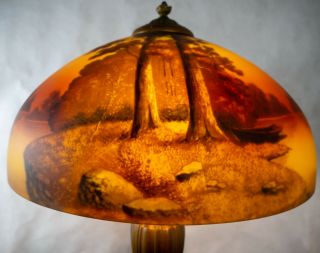 Phoenix reverse painted lamp with chipped ice finish.  Forest scene c.  1920 2