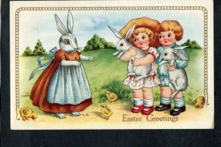 E286 Postcard Easter Children Return White Bunnies To Dressed Mother Rabbit