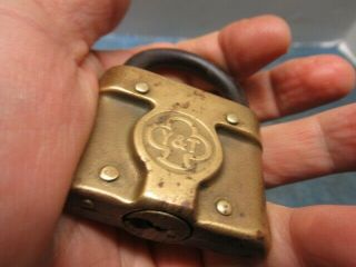 Odd shaped old brass padlock lock YALE.  Rare with the key.  n/r 3