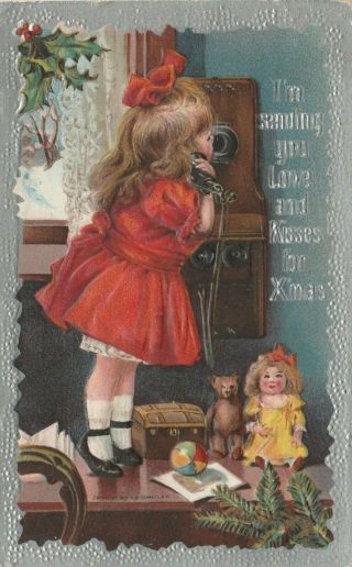 Postcard Sending You Love And Kisses For Xmas Girl On Phone Embossed Unposted
