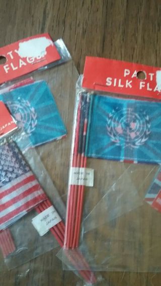 4X VINTAGE MINIATURE SILK FLAGS Party Favors NIP - - US,  Canada,  France,  UK & UN 3