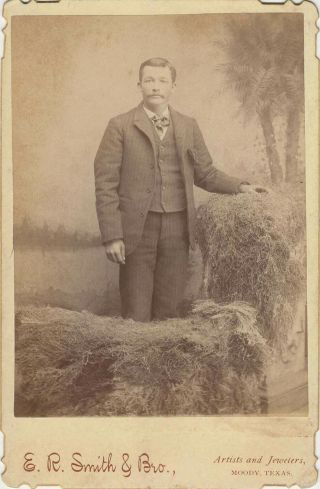 Texas Cabinet Card Of A Man Standing In Hay