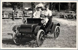 Rppc Man And Woman In Period Clothing In Antique Car